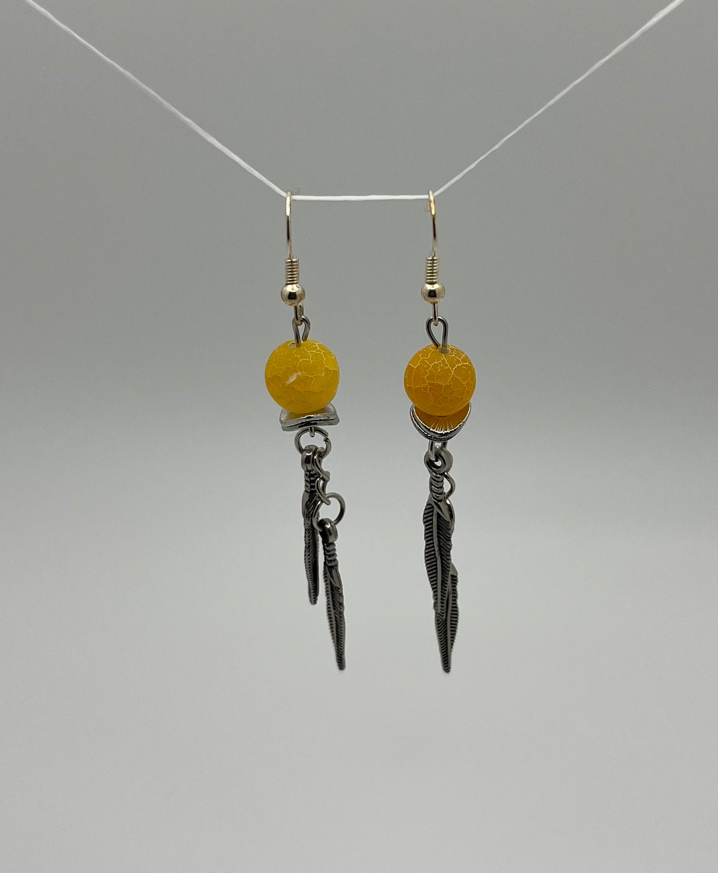Yellow Agate Drop Earrings with Silver Feather Charms