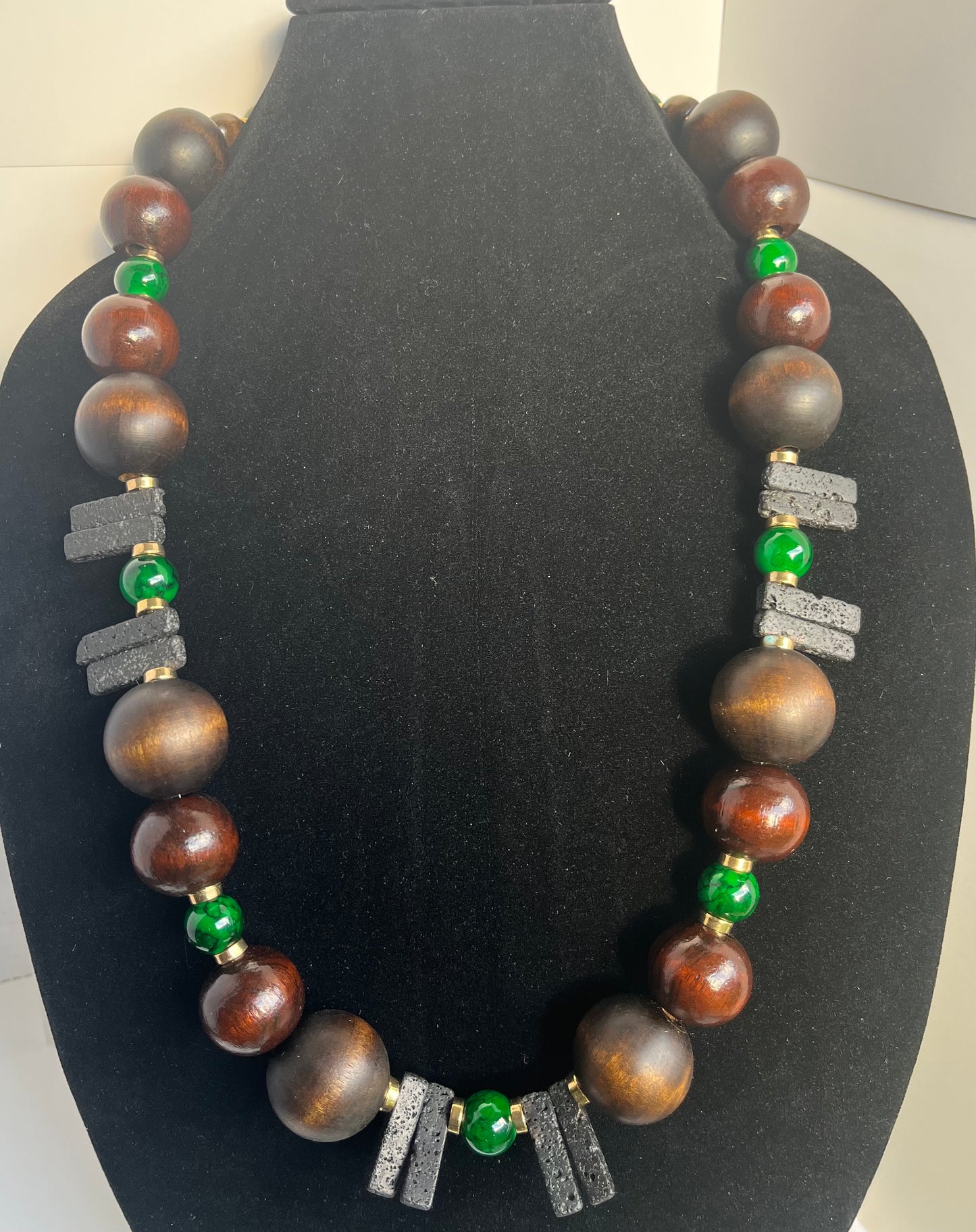 Black Lava, Emerald Glass, Wood Beads, Gold Accents